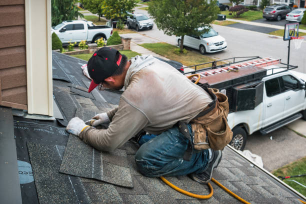 Professional Gutter Repair And Installation technician working in Mission Hills, KS